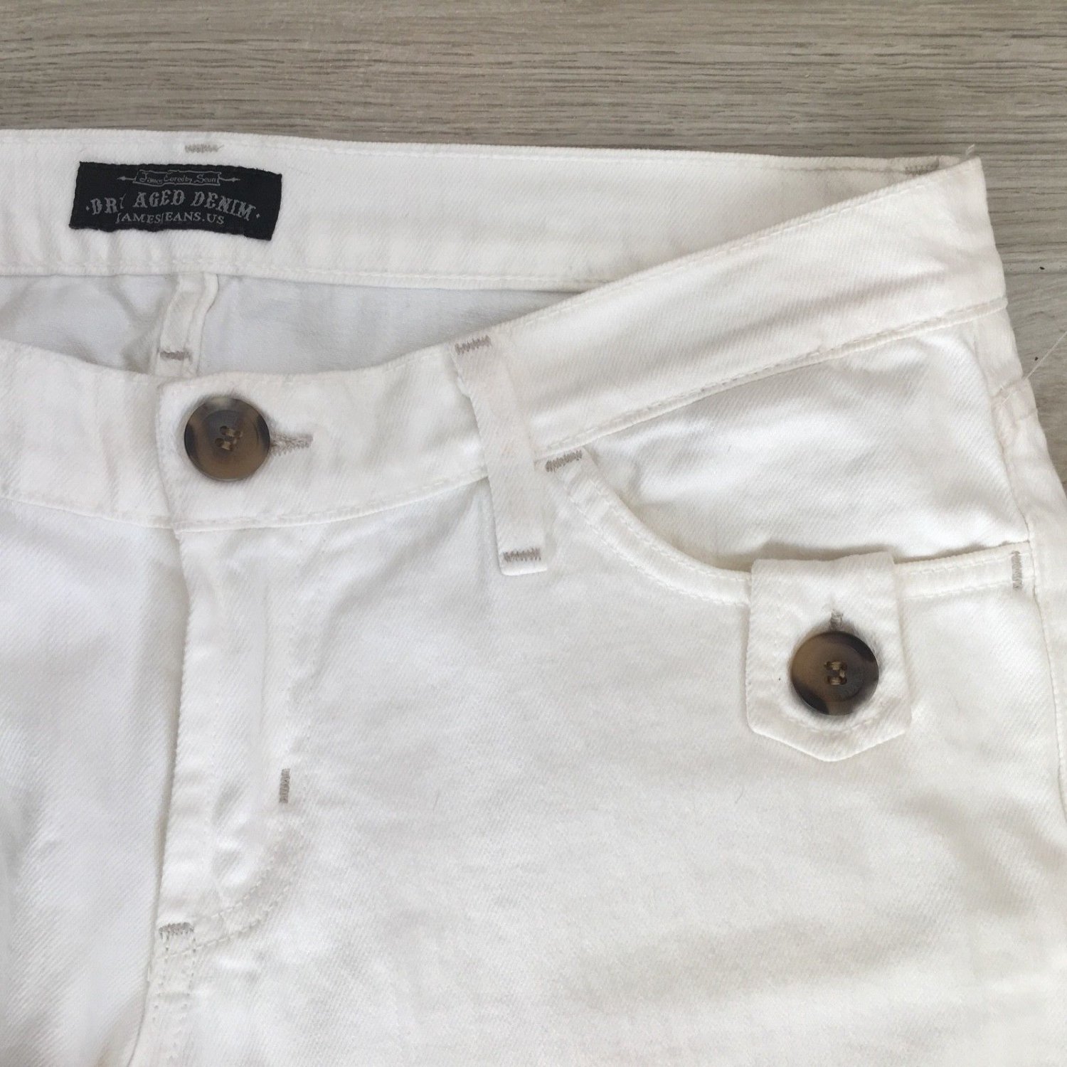 white bootleg trousers