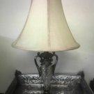 Silver scroll table lamp
