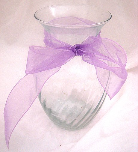 Vase with a light purple ribbon