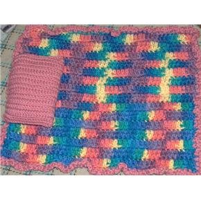 Hand crocheted Doll blanket in pink multi with a pink pillow