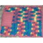 Hand crocheted Doll blanket in pink multi with a pink pillow