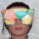 multi colored eye mask-pillow with pale pink strap