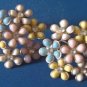 poured plastic and Rhinestone clip earrings 1950's - pastel flowers on goldtone
