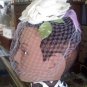 birdcage style veil white roses with lavender ribbon and net vintage hat