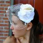 birdcage style veil white roses with lavender ribbon and net vintage hat