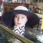 Black  and white wide-brimmed Styled by Quaker Maid vintage hat