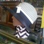 Black  and white wide-brimmed Styled by Quaker Maid vintage hat