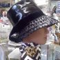 Black patent leather and straw vintage hat with velvet band and tails