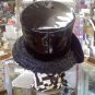 Black patent leather and straw vintage hat with velvet band and tails