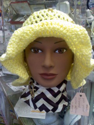 Pale Yellow hat with floppy brim and tan vintage buttons