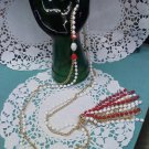 goldtone chain with red and white faceted plastic beads tassel necklace 1960's