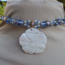 MOTHER OF PEARL CARVED FLOWER PENDANT ON LAMPWORK CHOKER