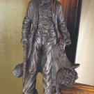 Cowboy with Rifle and Saddle