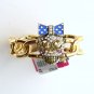 Betsey Johnson Ivy League Skull Gold Tone Stretch Link Bracelet