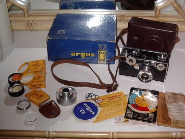 Argus C3 Brick Camera with leather case, orginal box and extras shown