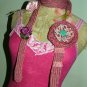 Ditsy print hand knitted necktie with corsages..