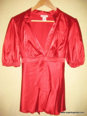 CANDIE'S brilliant red shirt