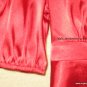 CANDIE'S brilliant red shirt