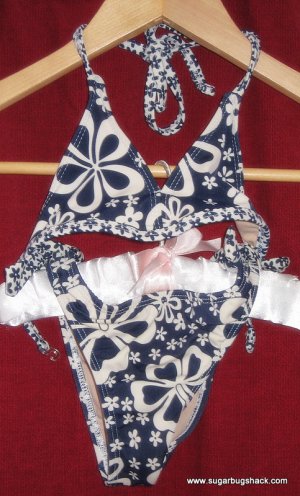 Hibiscus flowered swim suit Size xs 4-5
