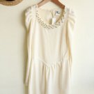 White with pearl neckline and puff sleeves