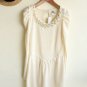 White with pearl neckline and puff sleeves