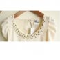 White with pearl neckline and puff sleeves
