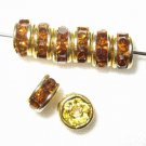 20 Swarovski Rondelles 5mm Gold/ Smoke Topaz (F) SR570F