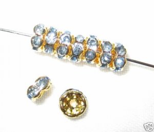 20 Swarovski Rondelles 6mm Gold /Light Sapphire - SR662