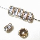 100 Swarovski Rondelle Spacer 4mm Antique Brass/Crystal