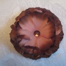 4 inch brown flower on an alligator clip
