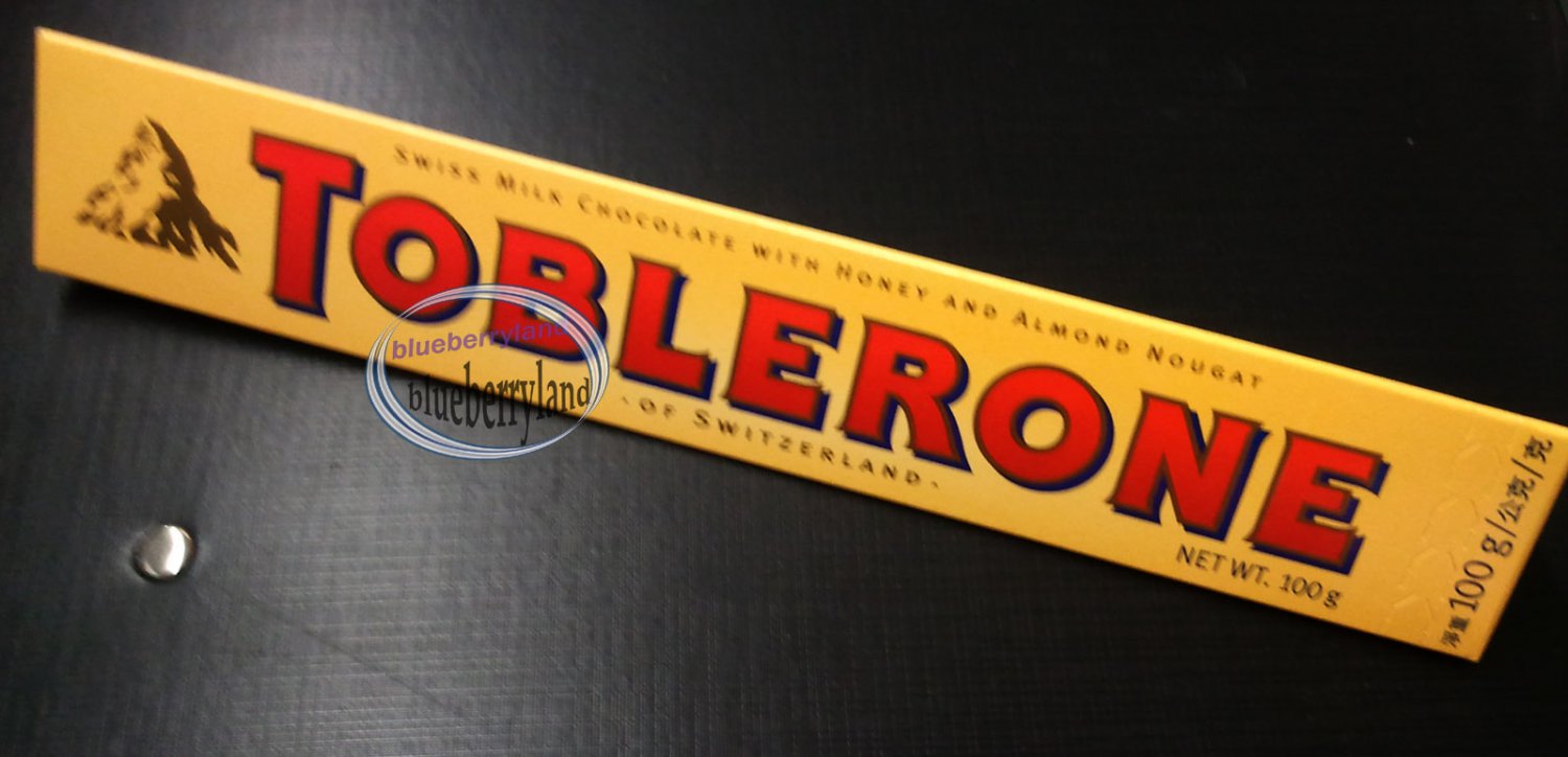 Toblerone Swiss Milk Chocolate With Honey And Almond Nougat Bar Snack