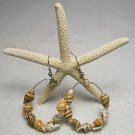 Shell Hoop ear rings.  Visit Our Store twodotts.ecrater.com