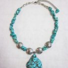 Turquoise color beaded necklace with pendant Turquoise color beaded necklace with pendant