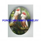 2 LEADBEATERS COCKATOO BIRD UNSET PORCELAIN CAMEO CABO