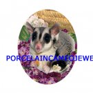 SUGAR GLIDER WITH VIOLET UNSET CAMEO PORCELAIN 30X40MM