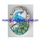 BLUE PEACOCK BIRD DOGWOOD UNSET CAMEO PORCELAIN 18X25