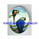 2 BLUE PARROT MACAW BIRD ORCHID UNSET PORCELAIN CAMEO