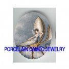 SEASHELL FAIRY ON SEASHELL BOAT* UNSET CAMEO PORCELAIN CAB