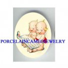 2 KEWPIE BABY READ BOOK ROBIN BIRD PORCELAIN CAMEO 1825