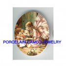 BUTTERFLY FAIRY HUGGING MOUSE* UNSET CAMEO PORCELAIN CAB