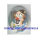 SMILING CLOWN WITH DAISY UNSET CAMEO PORCELAIN CAB