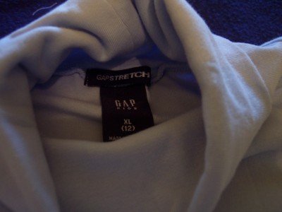 light blue turtleneck shirt