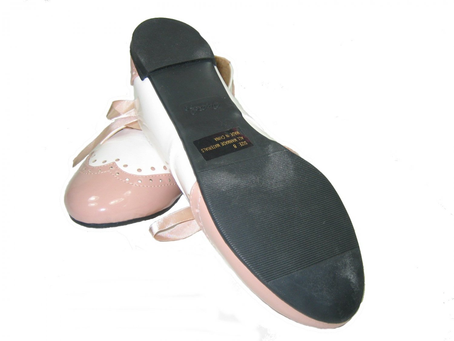 white flats with ribbon