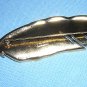 Brushed gold plate feather or quill pin D'Orlan mint condition ll1978