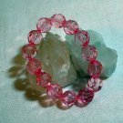 Bubble gum pink faceted lucite plastic bead stretch bracelet as new vintage ll1404