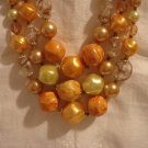 Triple strand graduated mixed plastic beads yellow orange excellent mid-century vintage ll2436