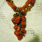 Triple strand mixed bead necklace cluster front orange turquoise amber ll2482