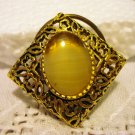 Gold tone filigree scarf or dress clip oval onyx center vintage costume jewelry ll2532