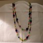 Jewel toned glass bead necklace 56 inch rope brilliant colors perfect vintage ll2592