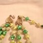 Multi green triple strand necklace twisted plastic beads very good vintage ll2918